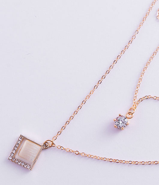 Geometric Layered Necklace with Crystal Accents