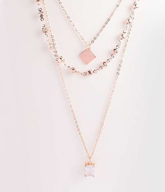 Rose Gold Triple-Layered Necklace with Geometric Charms