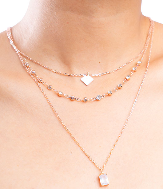 Rose Gold Triple-Layered Necklace with Geometric Charms