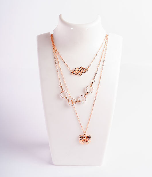 Rose Gold Triple-Layer Necklace with Heart and Bow Accents